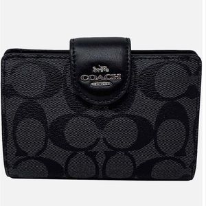 Coach Corner Zip Black Wallet in Signature Canvas